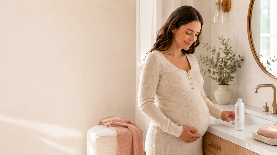 Pregnant woman with alcohol-free mouthwash bottle in bathroom