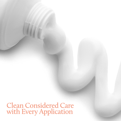White squeeze bottle dispensing a thick, wavy white cream or gel on a clean white background, with orange text in the lower left reading 'Clean Considered Care with Every Application'.